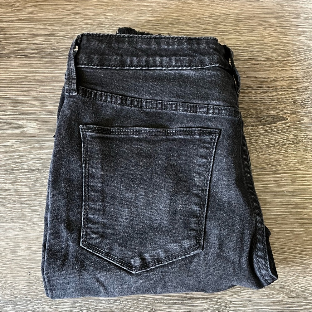 Women’s size 10/30R, A New Day black distressed skinny jeans